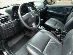 PAJERO TR4 4X4, AUTOMÁTICA 2012, COM APENAS 1000.000 KM, HISTÓRICO COMPLETO DE MANUTENÇÕES, IMPECÁVEL ESTADO imagem 9 PAJERO TR4 4X4, AUTOMÁTICA 2012, COM APENAS 1000.000 KM, HISTÓRICO COMPLETO DE MANUTENÇÕES, IMPECÁVEL ESTADO imagem 9