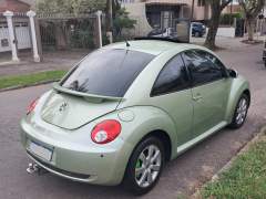 NEW BEETLE 2007, CÂMBIO MANUAL, TETO SOLAR, BANCOS EM COURO, MANUAIS E CHAVE RESERVA imagem 7 NEW BEETLE 2007, CÂMBIO MANUAL, TETO SOLAR, BANCOS EM COURO, MANUAIS E CHAVE RESERVA imagem 7