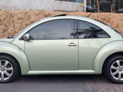 NEW BEETLE 2007, CÂMBIO MANUAL, TETO SOLAR, BANCOS EM COURO, MANUAIS E CHAVE RESERVA imagem 4 NEW BEETLE 2007, CÂMBIO MANUAL, TETO SOLAR, BANCOS EM COURO, MANUAIS E CHAVE RESERVA imagem 4
